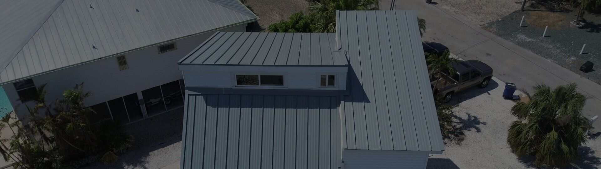 Multi level metal roof installed by Cathedral Roofing. Photo taken by drone.
