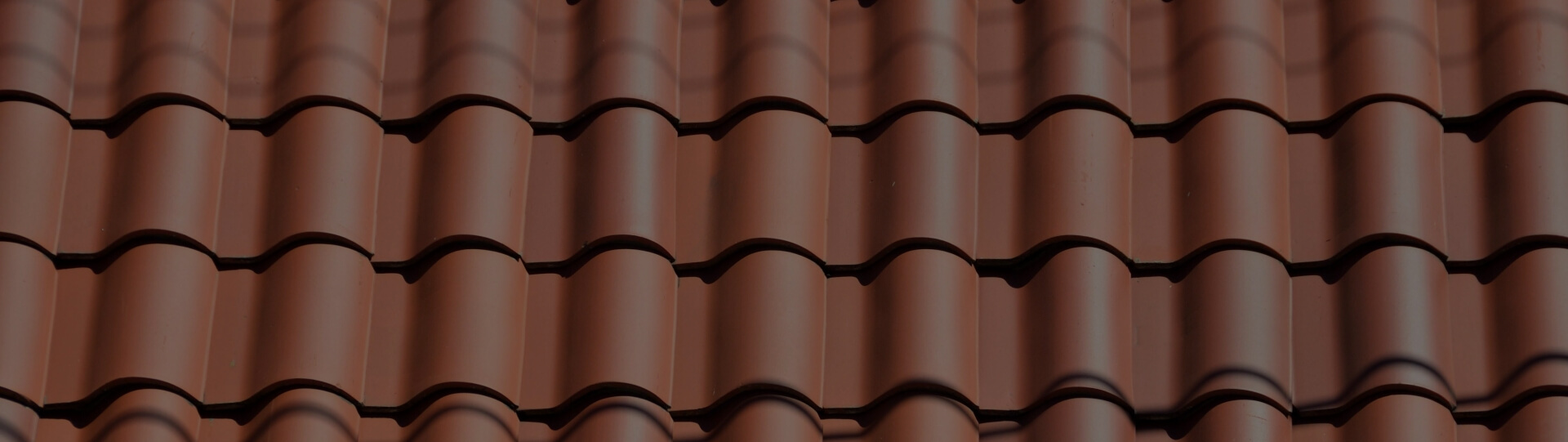 Close up of red tile shingles