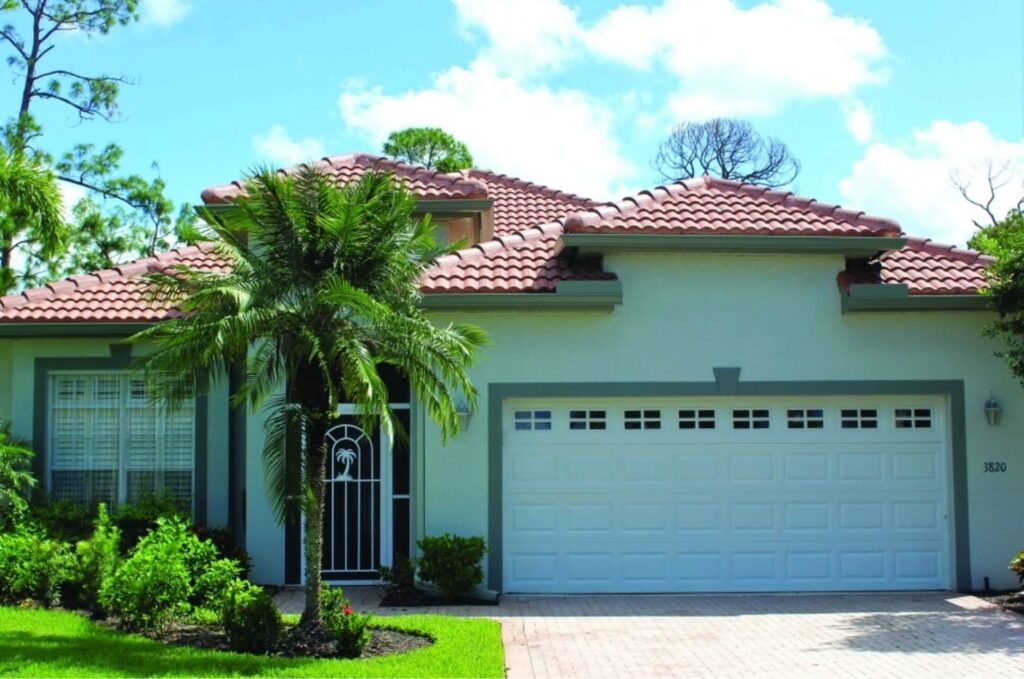 Red Tile Roof on home with attached garage in Tampa (St. Petersburg), Florida.