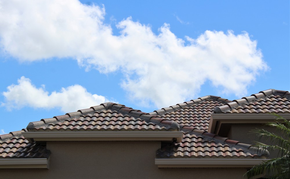 Multi level red tile roof in Florida